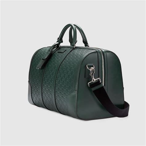 men's signature leather gucci duffle|gucci handbags for men.